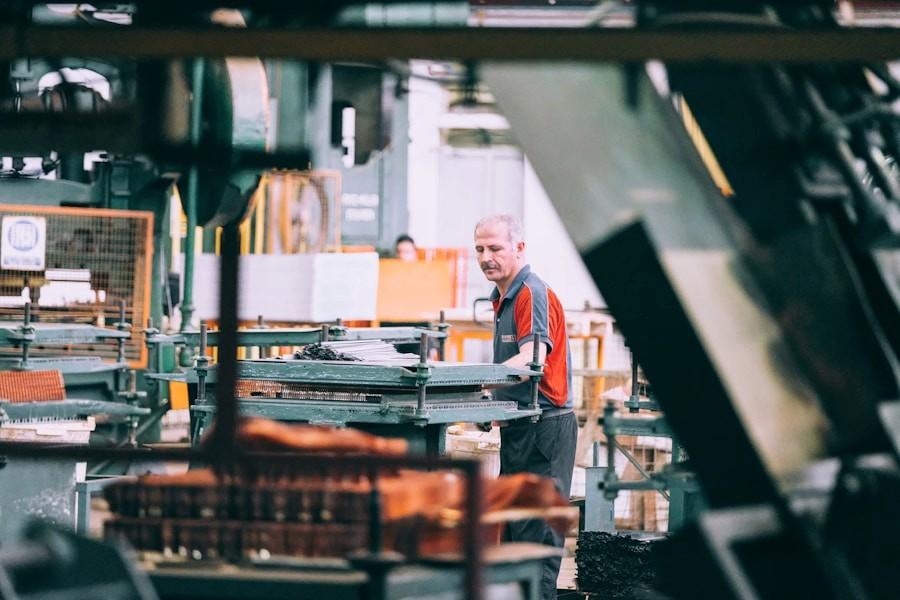 A worker on a factory floor